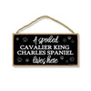 A Spoiled Cavalier King Charles Spaniel Lives Here, Funny Wooden Home Decor for Dog Pet Lovers, Hanging Wall Decorative Sign, 5 Inches by 10 Inches