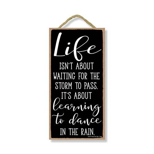 Life Isn't About Waiting For The Storm To Pass Sign
